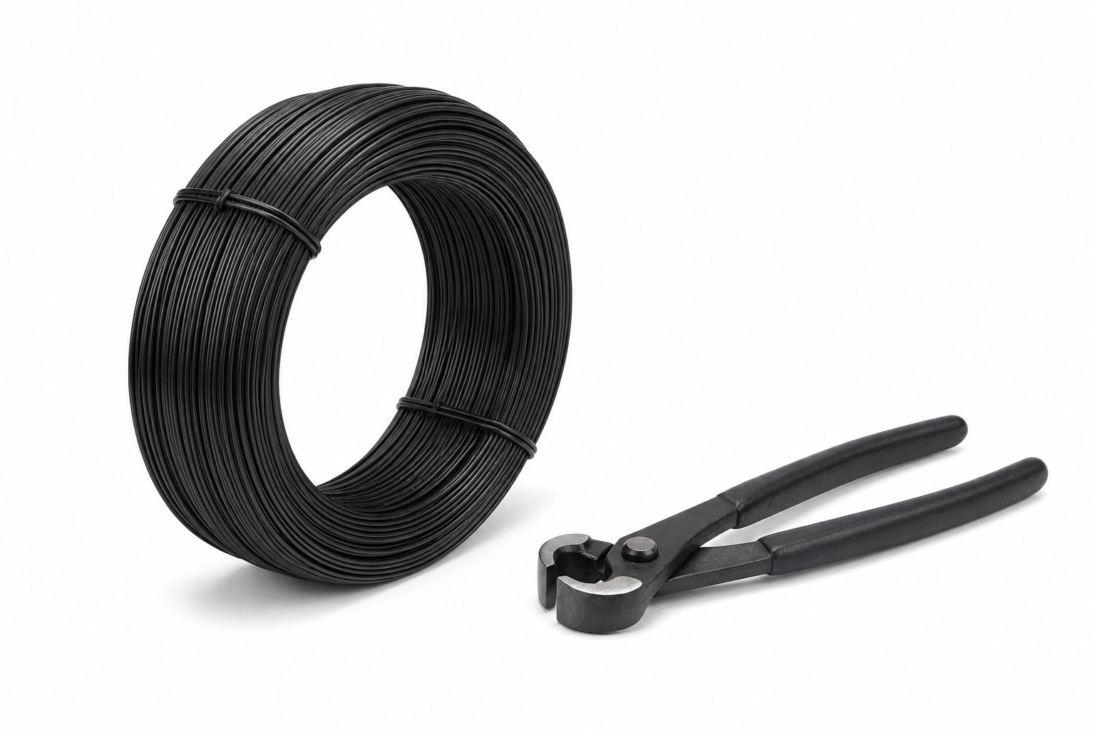 Binding Wire 25 kg Coil — Black annealed 1.6 mm binding wire in a 25 kg coil, with twisting pliers.